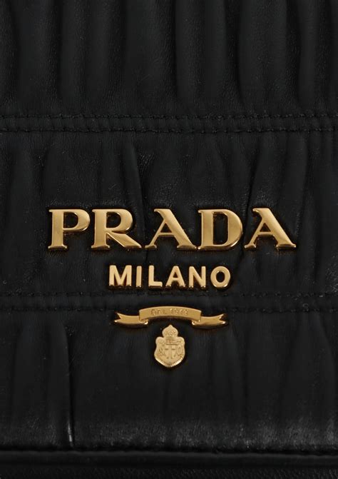 prada plaque shoulder bag|Prada nappa gaufre shoulder bag.